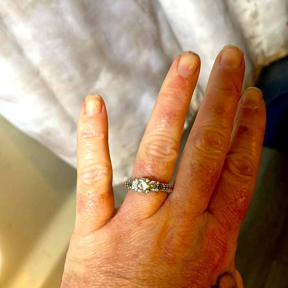 New in  sterling silver white gold and .5 kart